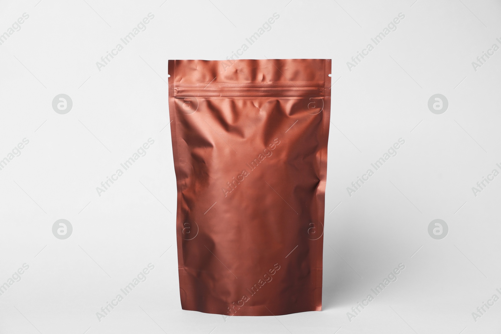 Photo of One zipper stand-up pouch on white background. Mockup for design