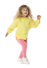 Photo of Cute little girl dancing on white background