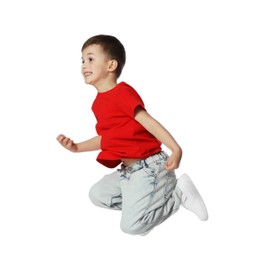 Photo of Happy little boy dancing on white background