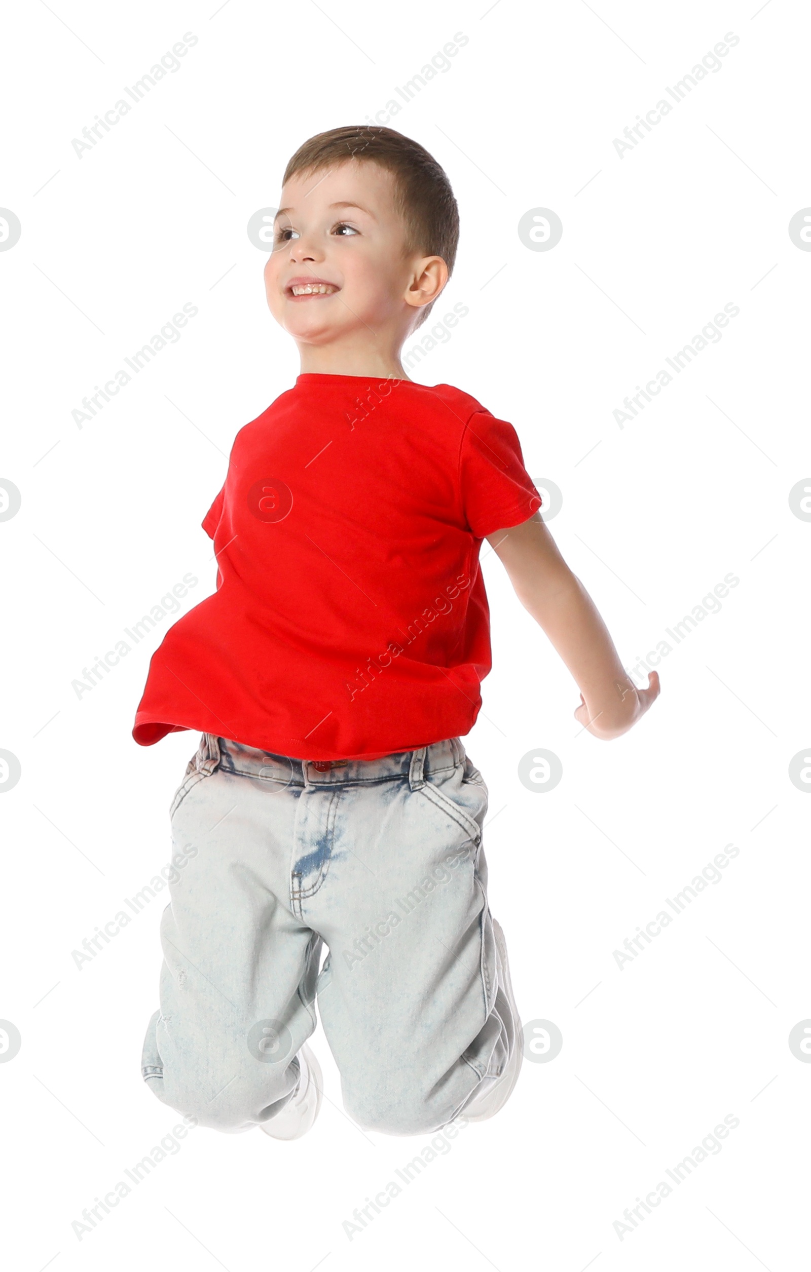 Happy little boy dancing on white background Photo of Happy little boy dancing on white background