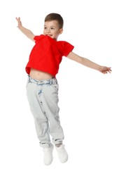 Photo of Happy little boy dancing on white background