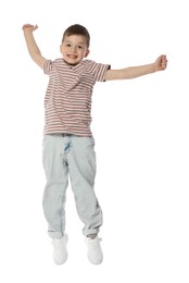 Photo of Happy little boy dancing on white background
