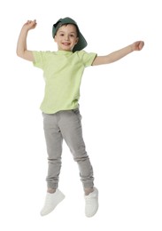 Photo of Happy little boy in baseball hat dancing on white background