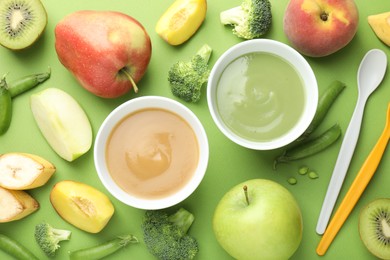 Photo of Baby food. Tasty puree in bowls and ingredients on green background, flat lay