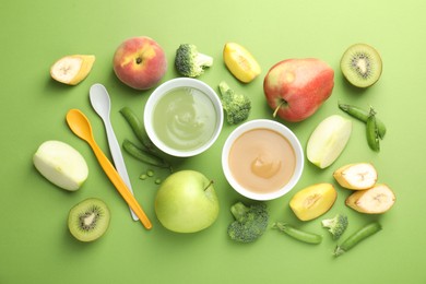 Photo of Baby food. Tasty puree in bowls and ingredients on green background, flat lay