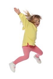 Photo of Cute little girl dancing on white background