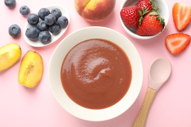 Photo of Baby food. Tasty puree in bowl and ingredients on pink background, flat lay