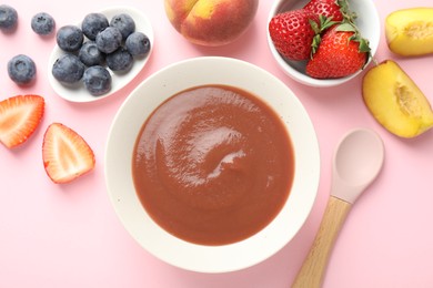 Photo of Baby food. Tasty puree in bowl and ingredients on pink background, flat lay