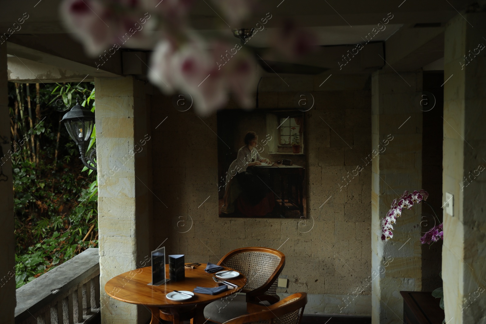 Bali, Indonesia - May 12, 2025: Modern restaurant with stylish wooden furniture Photo of Bali, Indonesia - May 12, 2025: Modern restaurant with stylish wooden furniture