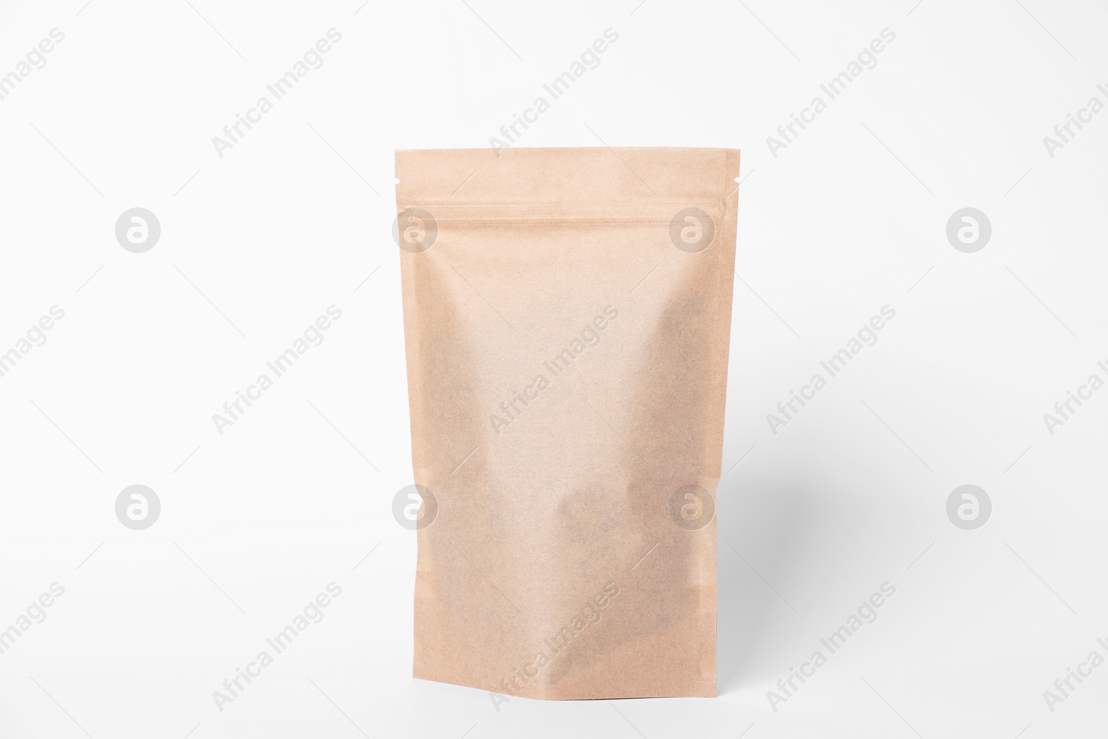 One zipper stand-up pouch on white background. Mockup for design Photo of One zipper stand-up pouch on white background. Mockup for design