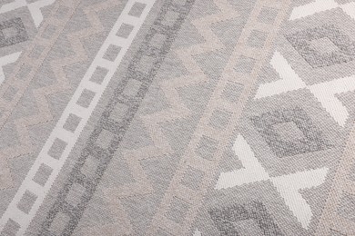 Photo of Stylish rug with pattern as background, closeup