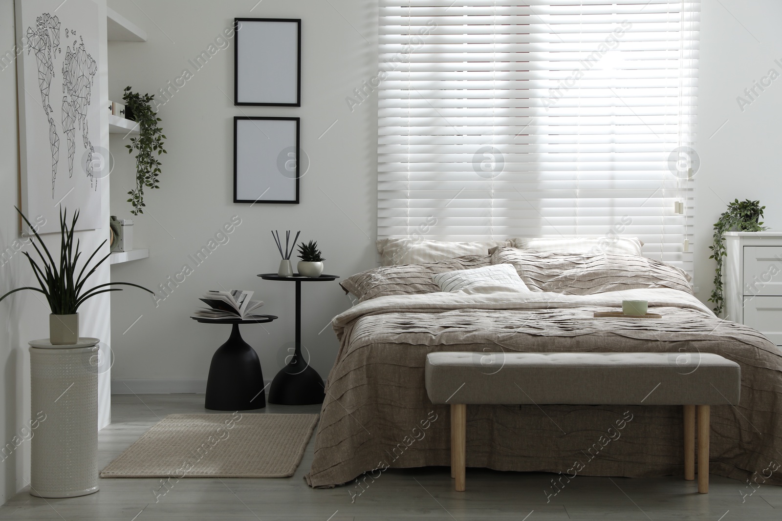 Photo of Comfortable bed with beautiful linens in bedroom