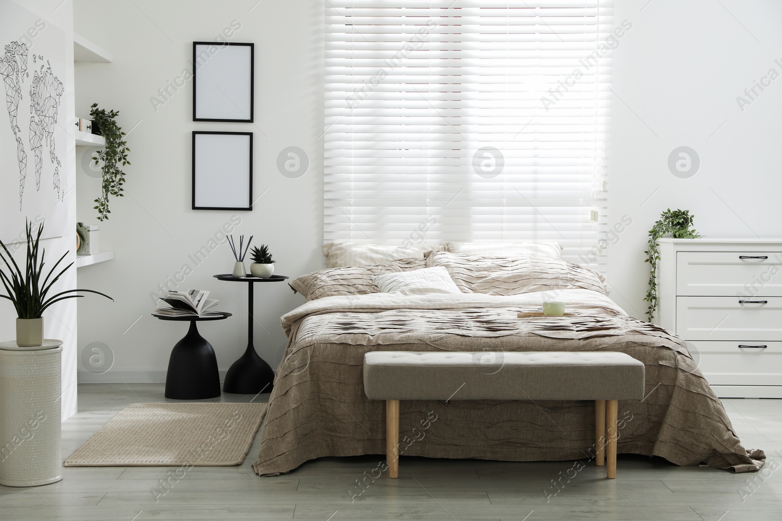 Photo of Comfortable bed with beautiful linens in bedroom
