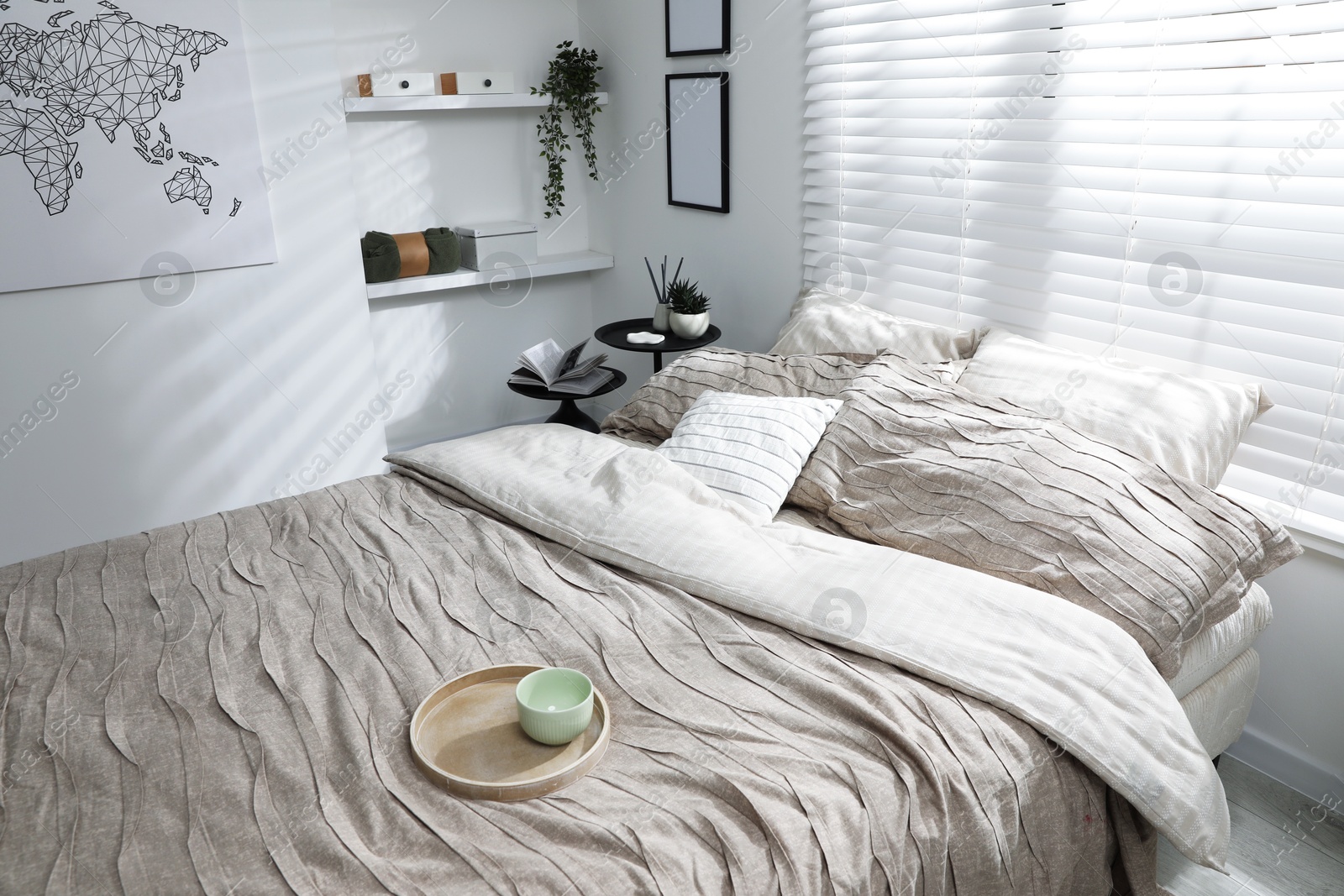 Photo of Comfortable bed with beautiful linens in bedroom, above view