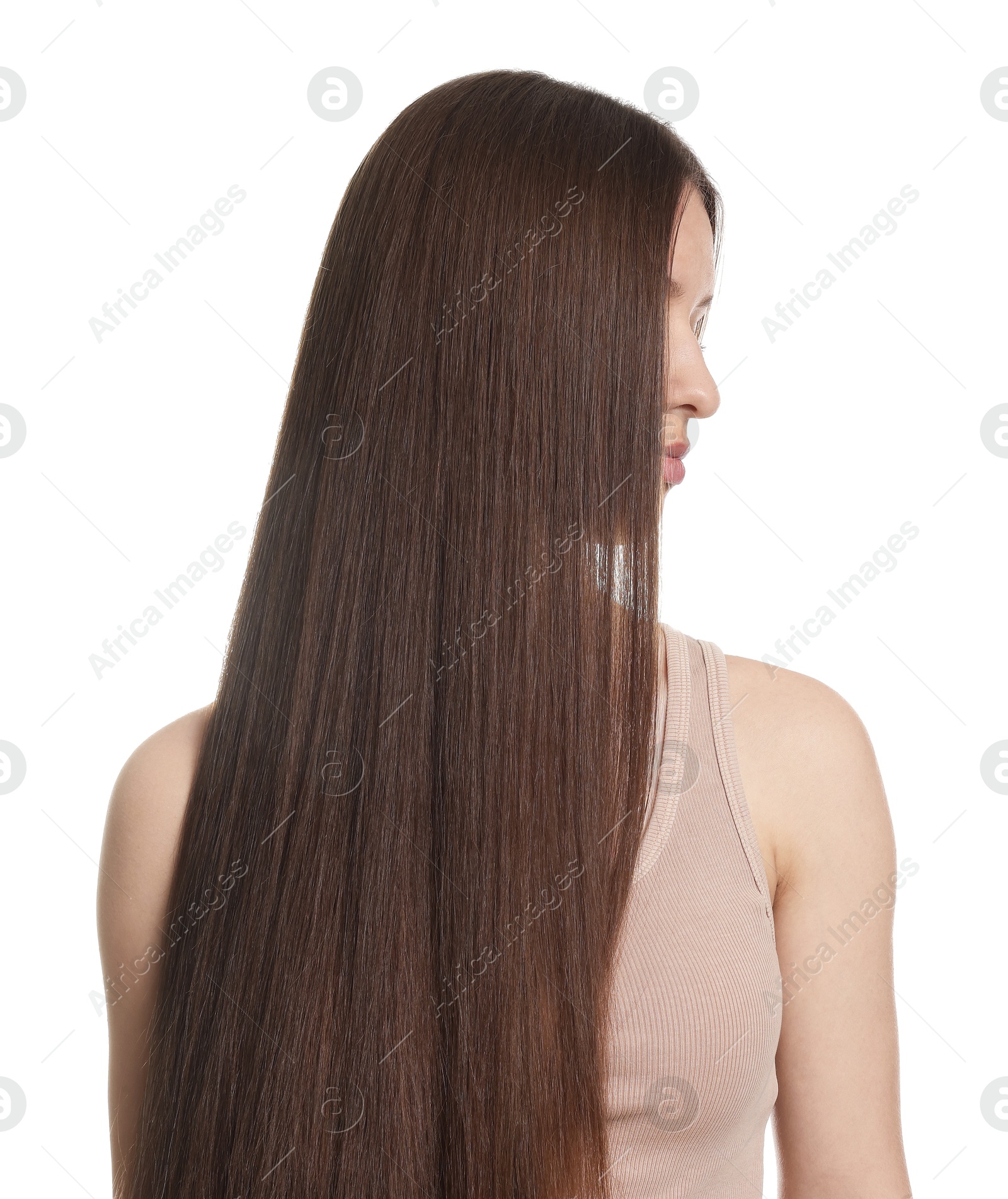 Teenage girl with healthy long hair on white background Photo of Teenage girl with healthy long hair on white background