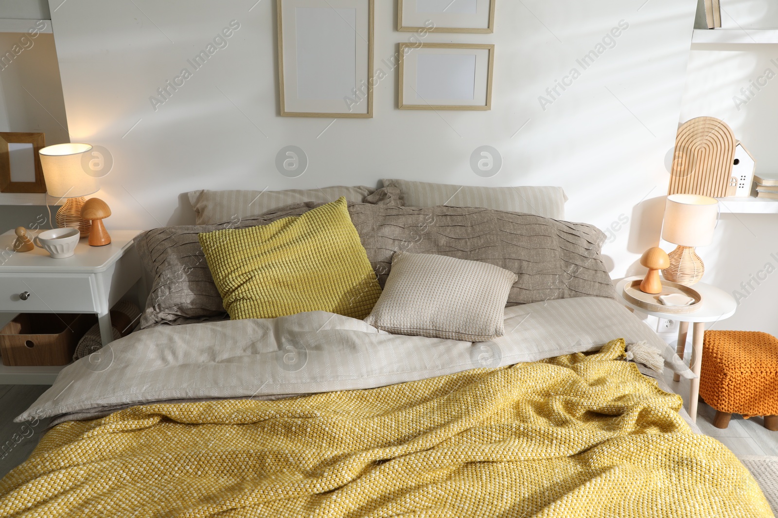 Photo of Comfortable bed with beautiful linens in bedroom, above view