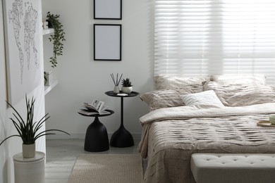 Photo of Comfortable bed with beautiful linens in bedroom