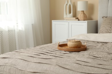 Photo of Comfortable bed with beautiful linens in bedroom