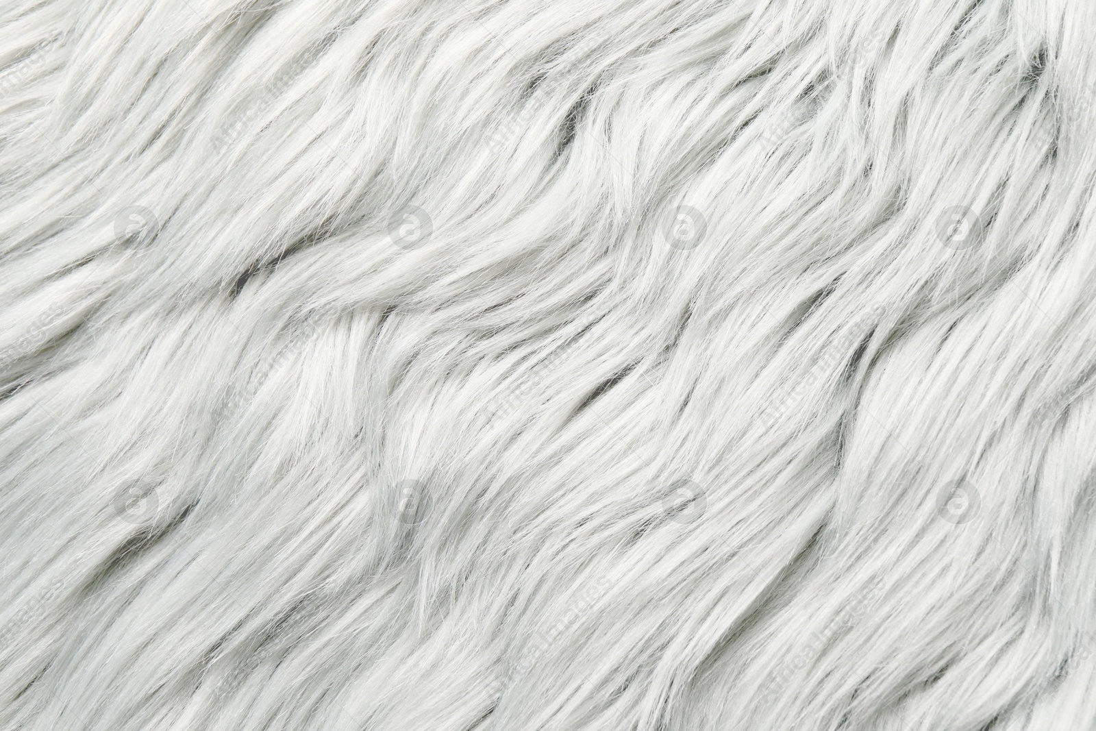 Texture of white furry fabric as background, closeup Image of Texture of white furry fabric as background, closeup