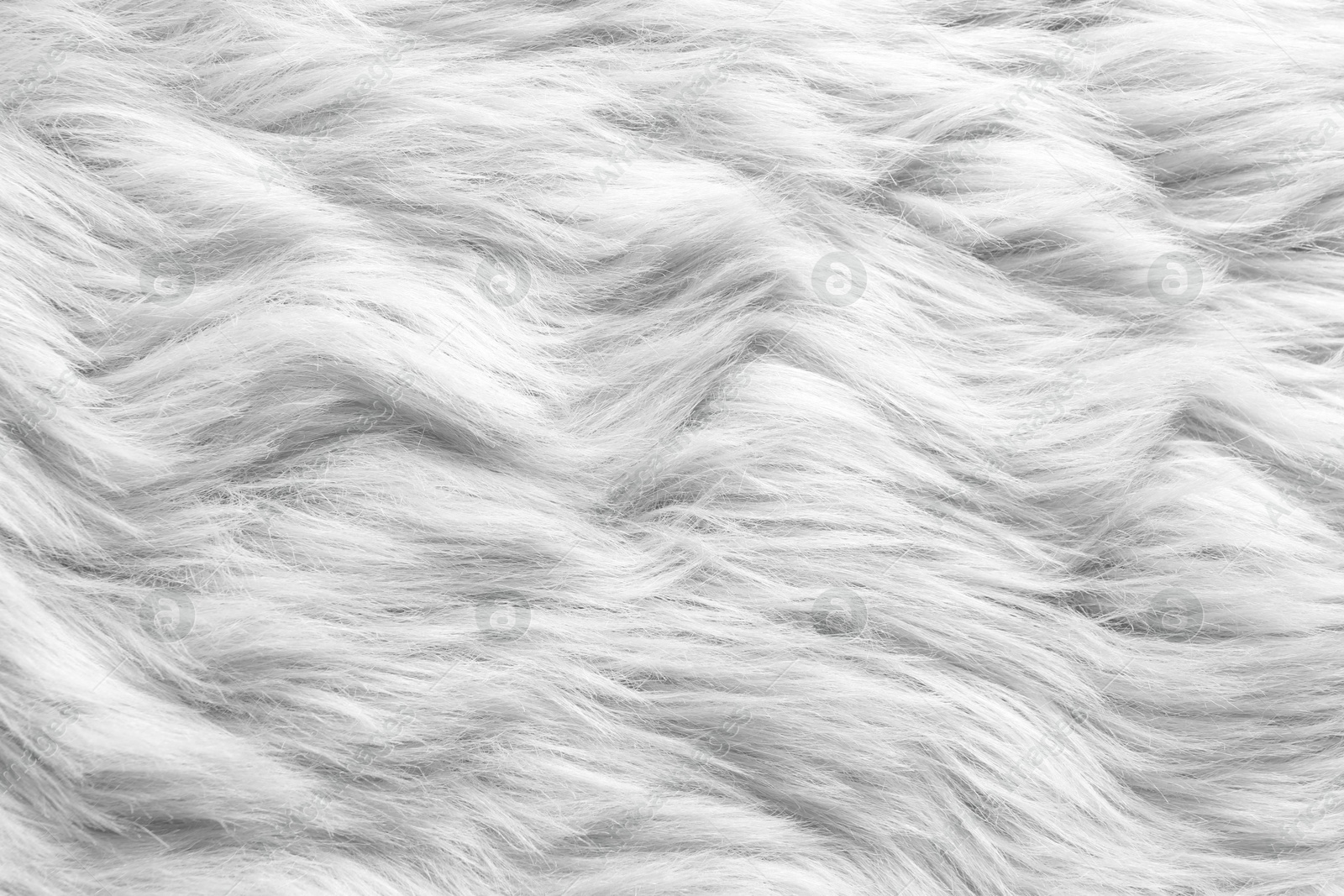 Texture of white furry fabric as background, closeup Image of Texture of white furry fabric as background, closeup
