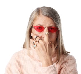Photo of Senior woman wearing different rings and sunglasses on white background