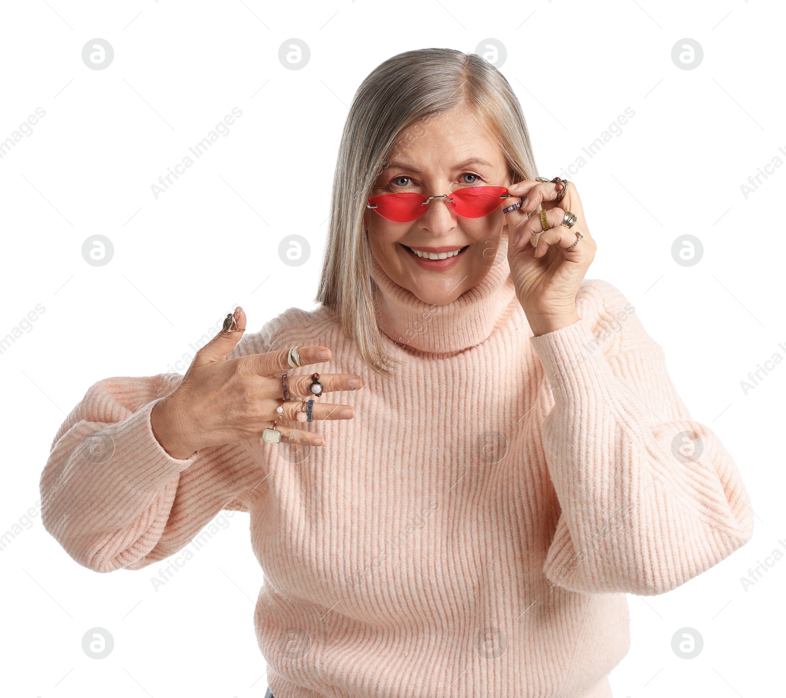 Photo of Senior woman wearing different rings and sunglasses on white background