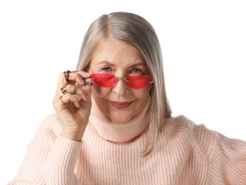 Photo of Senior woman wearing different rings and sunglasses on white background