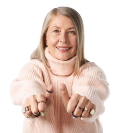 Photo of Senior woman wearing different rings and showing thumbs up on white background