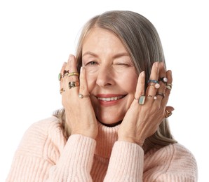 Photo of Senior woman wearing different rings on white background