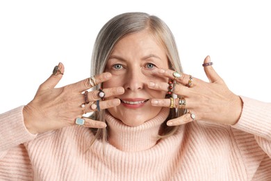 Photo of Senior woman wearing different rings on white background
