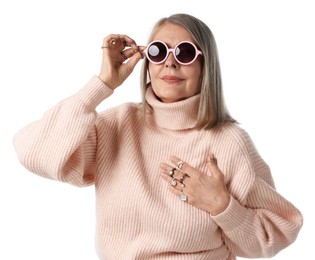 Photo of Senior woman wearing different rings and sunglasses on white background