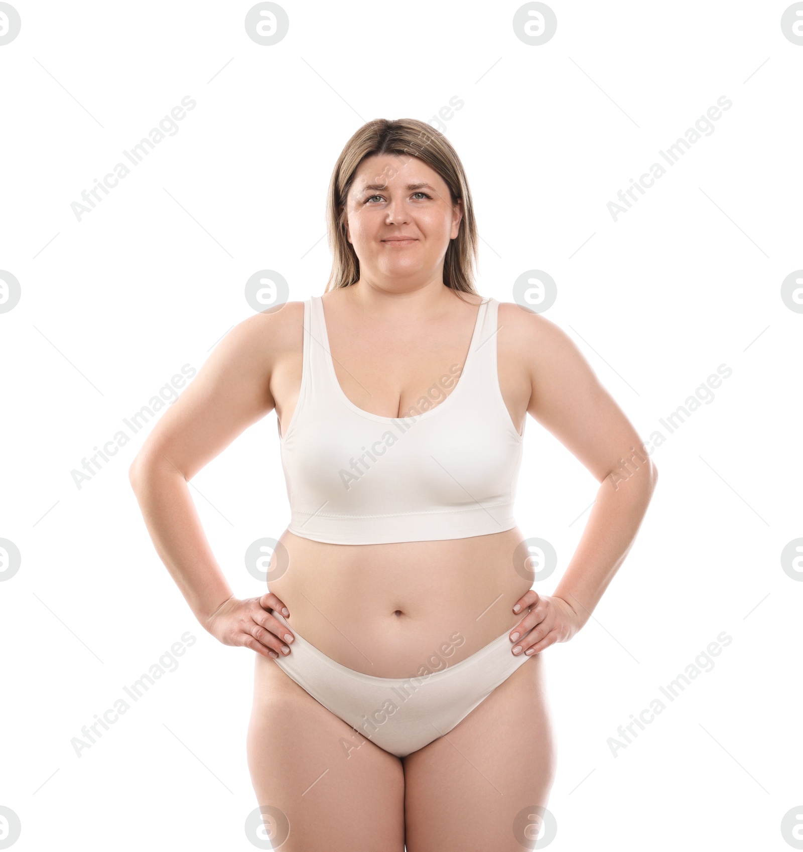 Weight loss. Plus size woman in underwear on white background Photo of Weight loss. Plus size woman in underwear on white background