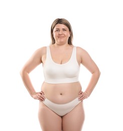 Photo of Weight loss. Plus size woman in underwear on white background