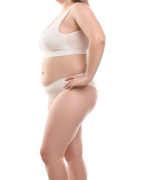 Photo of Weight loss. Plus size woman in underwear on white background, closeup