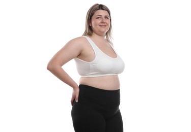 Photo of Weight loss. Plus size woman on white background