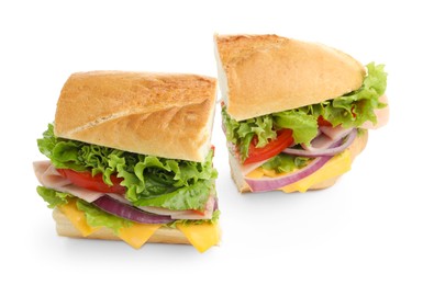 Photo of Pieces of tasty baguette sandwich with ham, cheese and vegetables isolated on white