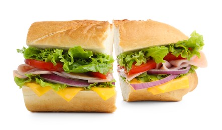 Photo of Pieces of tasty baguette sandwich with ham, cheese and vegetables isolated on white