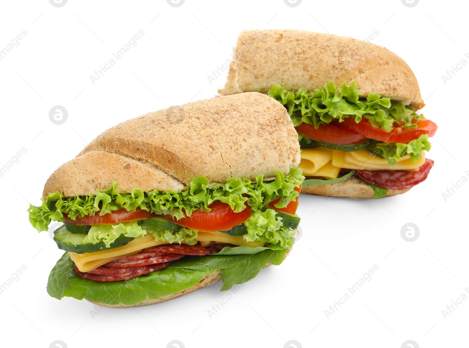 Photo of Pieces of tasty baguette sandwich with smoked sausage, cheese and vegetables isolated on white