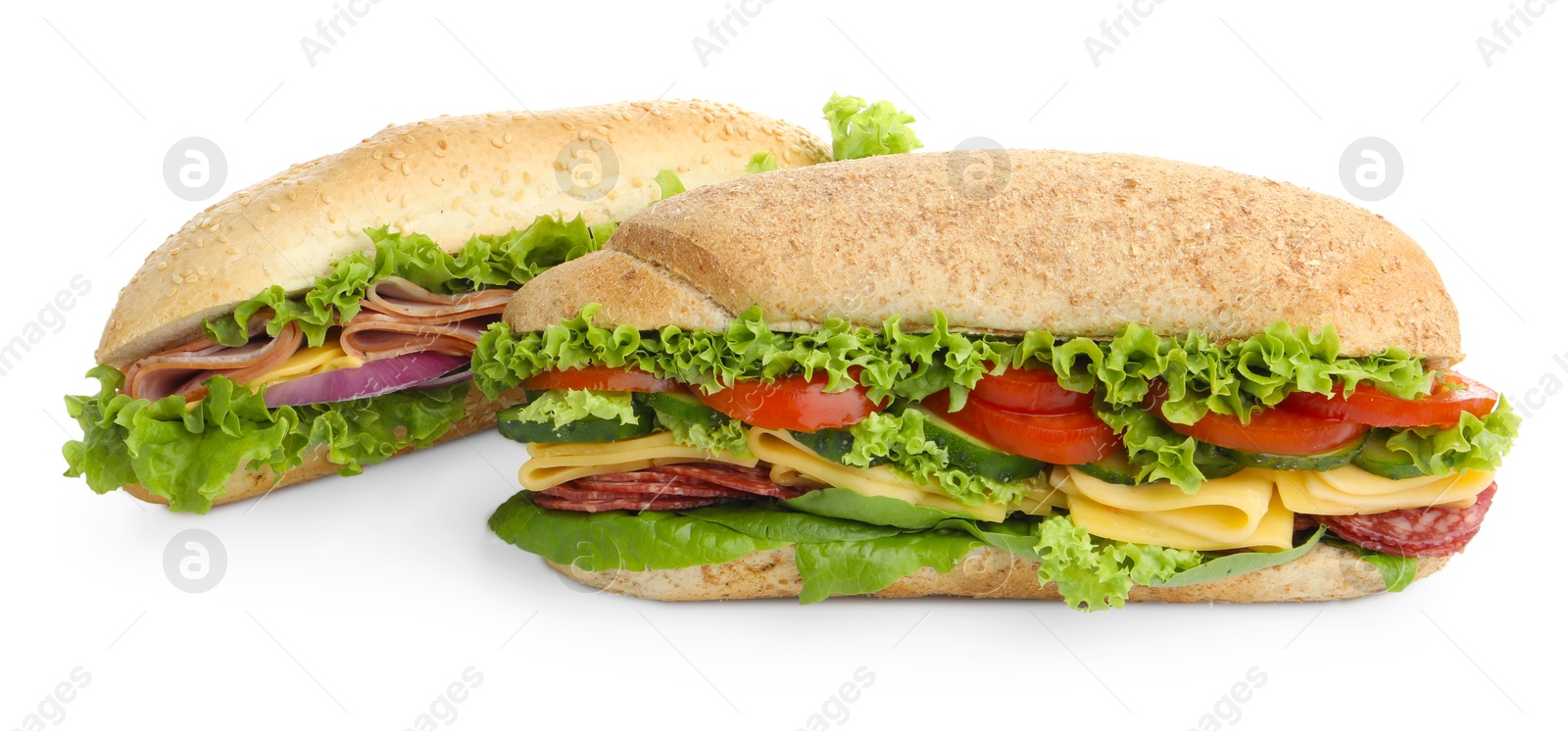 Tasty baguette sandwiches with smoked sausage, cheese and vegetables isolated on white Photo of Tasty baguette sandwiches with smoked sausage, cheese and vegetables isolated on white