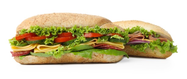 Photo of Tasty baguette sandwiches with smoked sausage, cheese and vegetables isolated on white