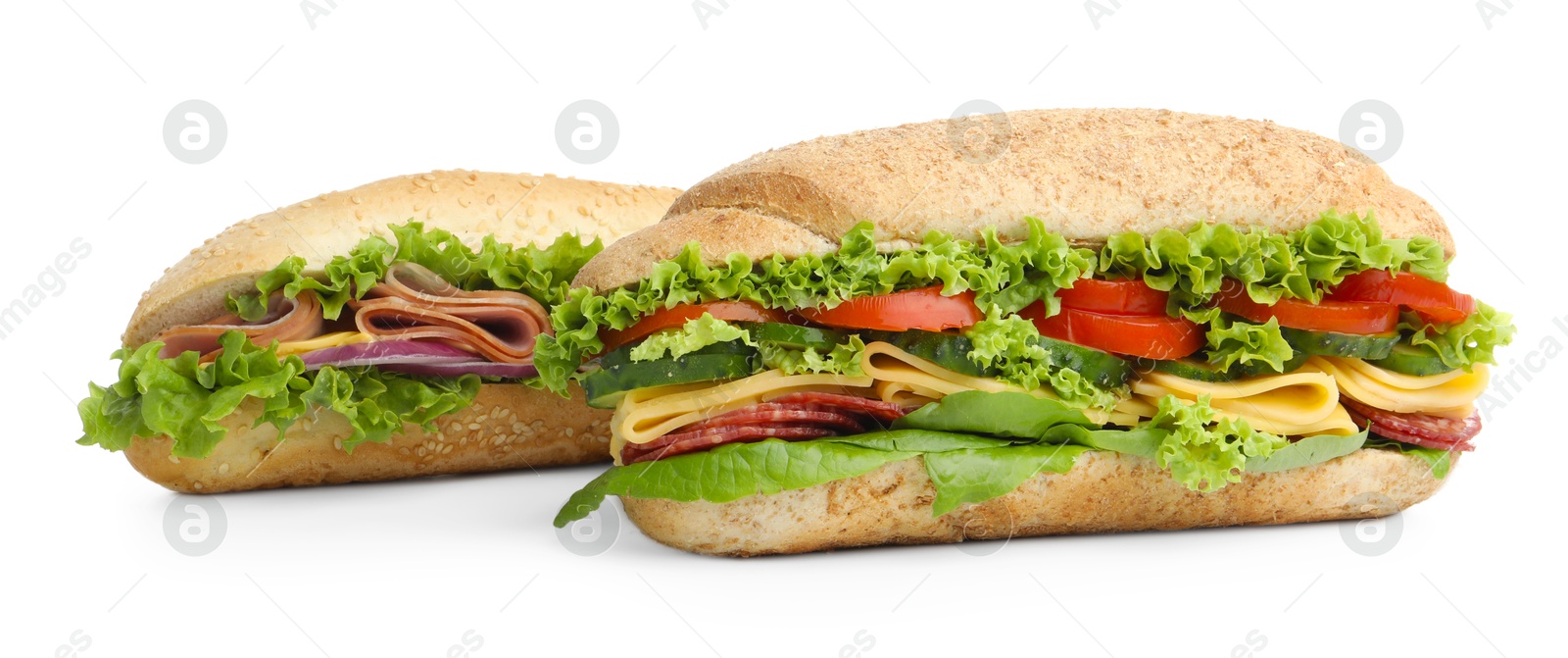 Tasty baguette sandwiches with smoked sausage, cheese and vegetables isolated on white Photo of Tasty baguette sandwiches with smoked sausage, cheese and vegetables isolated on white