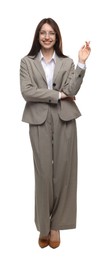 Photo of Happy woman in suit on white background