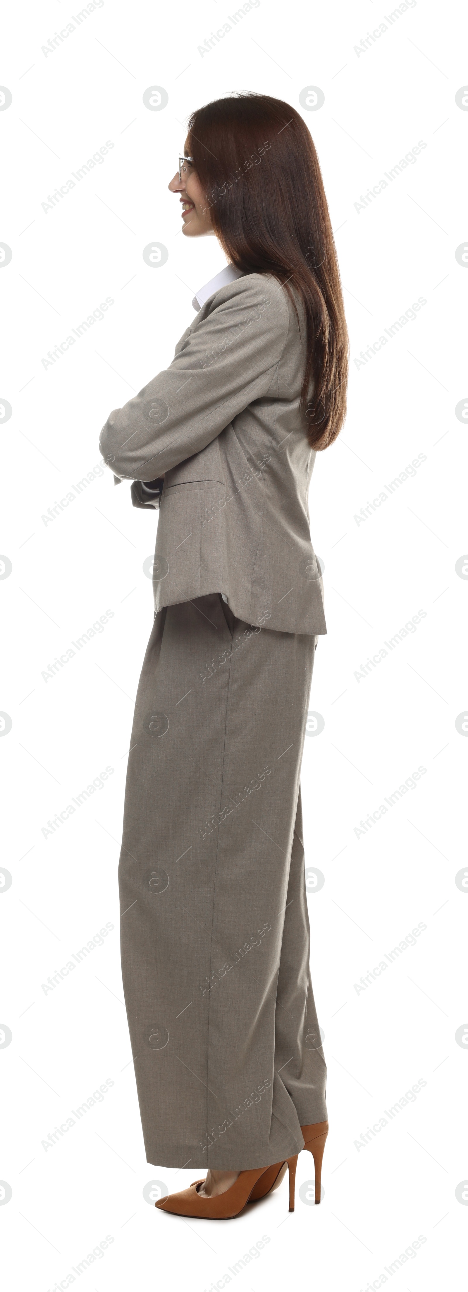 Happy woman in suit on white background Photo of Happy woman in suit on white background