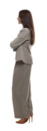 Photo of Happy woman in suit on white background