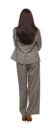 Photo of Confident woman in suit on white background, back view
