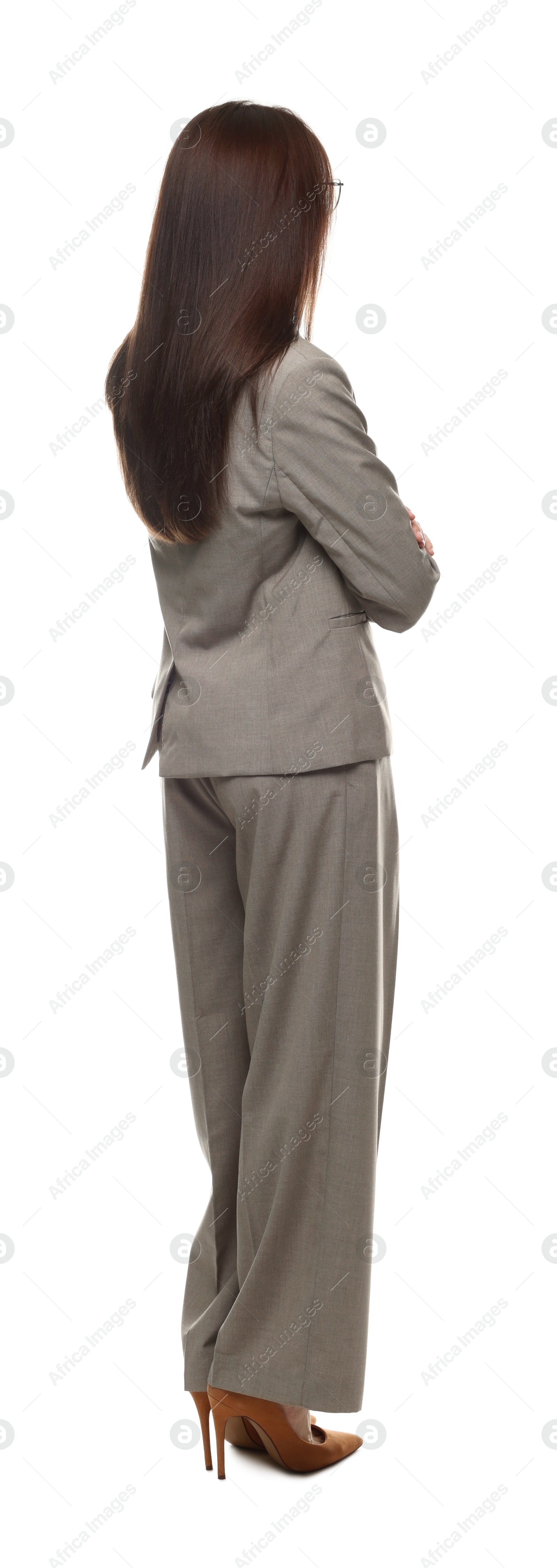 Confident woman in suit on white background Photo of Confident woman in suit on white background