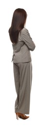 Photo of Confident woman in suit on white background