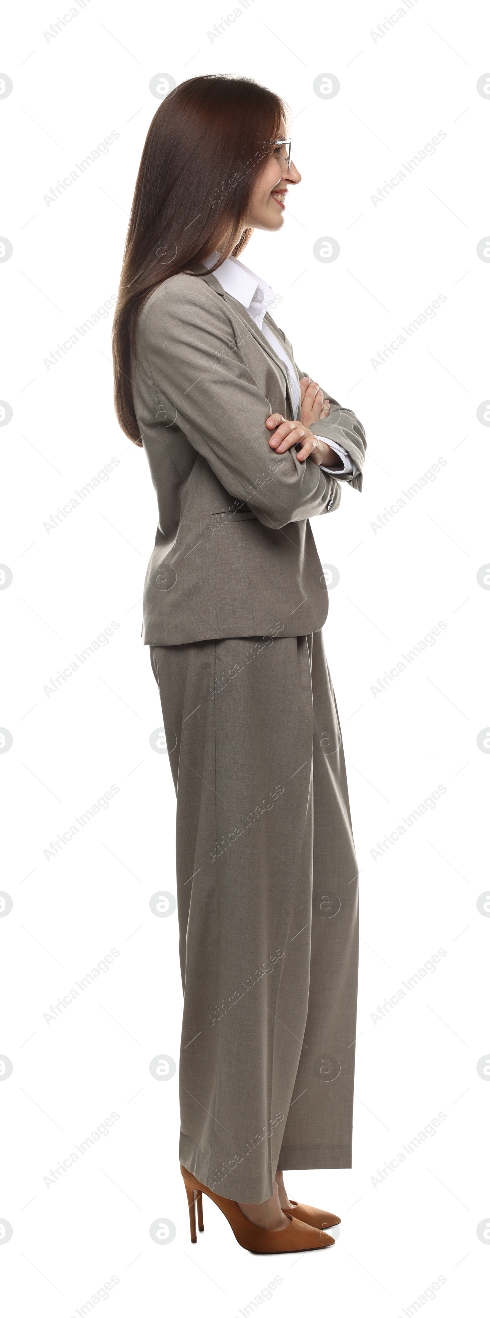Happy woman in suit on white background Photo of Happy woman in suit on white background
