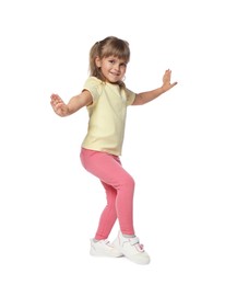 Photo of Happy little girl dancing on white background