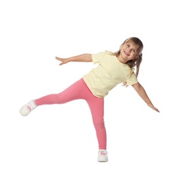 Photo of Happy little girl dancing on white background